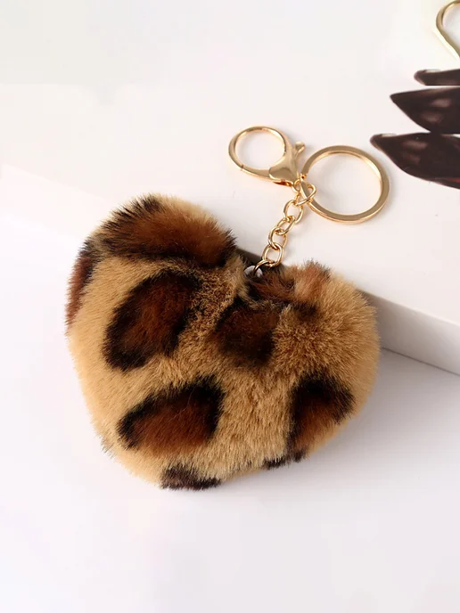 Фото товара 25612, брелок обвес на сумку пушистый тренд